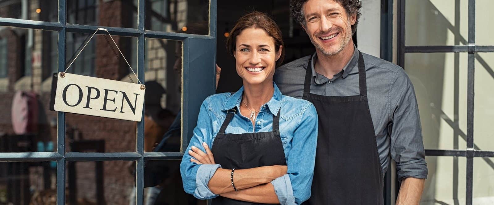 Business Owners in Front of Shop