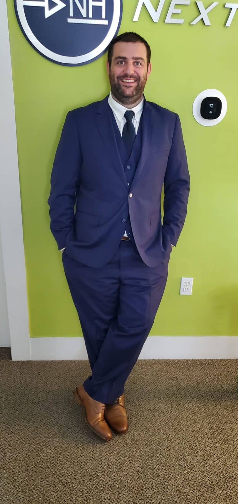 Daniel Falco headshot, Digital marketing Strategist for TheeDigital in a 3 blue 3 piece suit