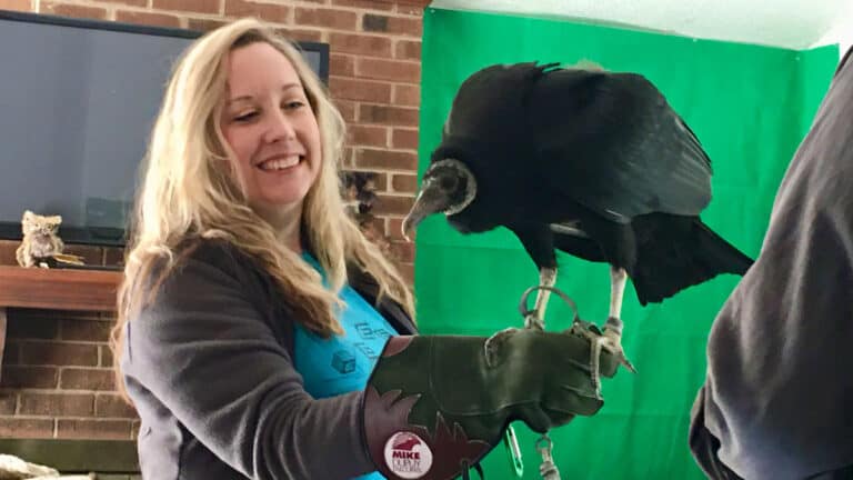 Keri holding black vulture