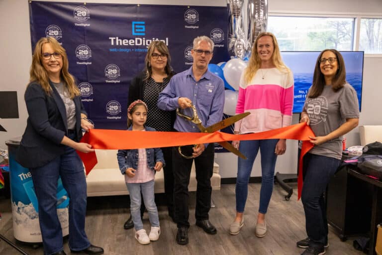 Ribbon cutting at new TheeDigital office