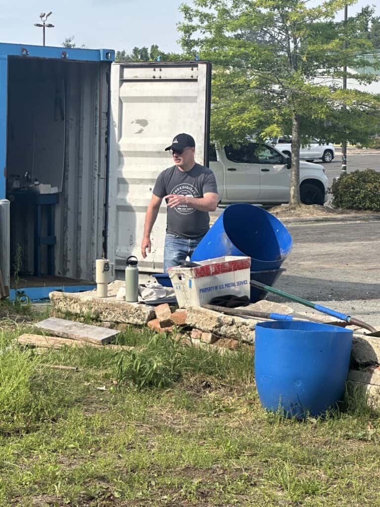 Richard tossing a barrel
