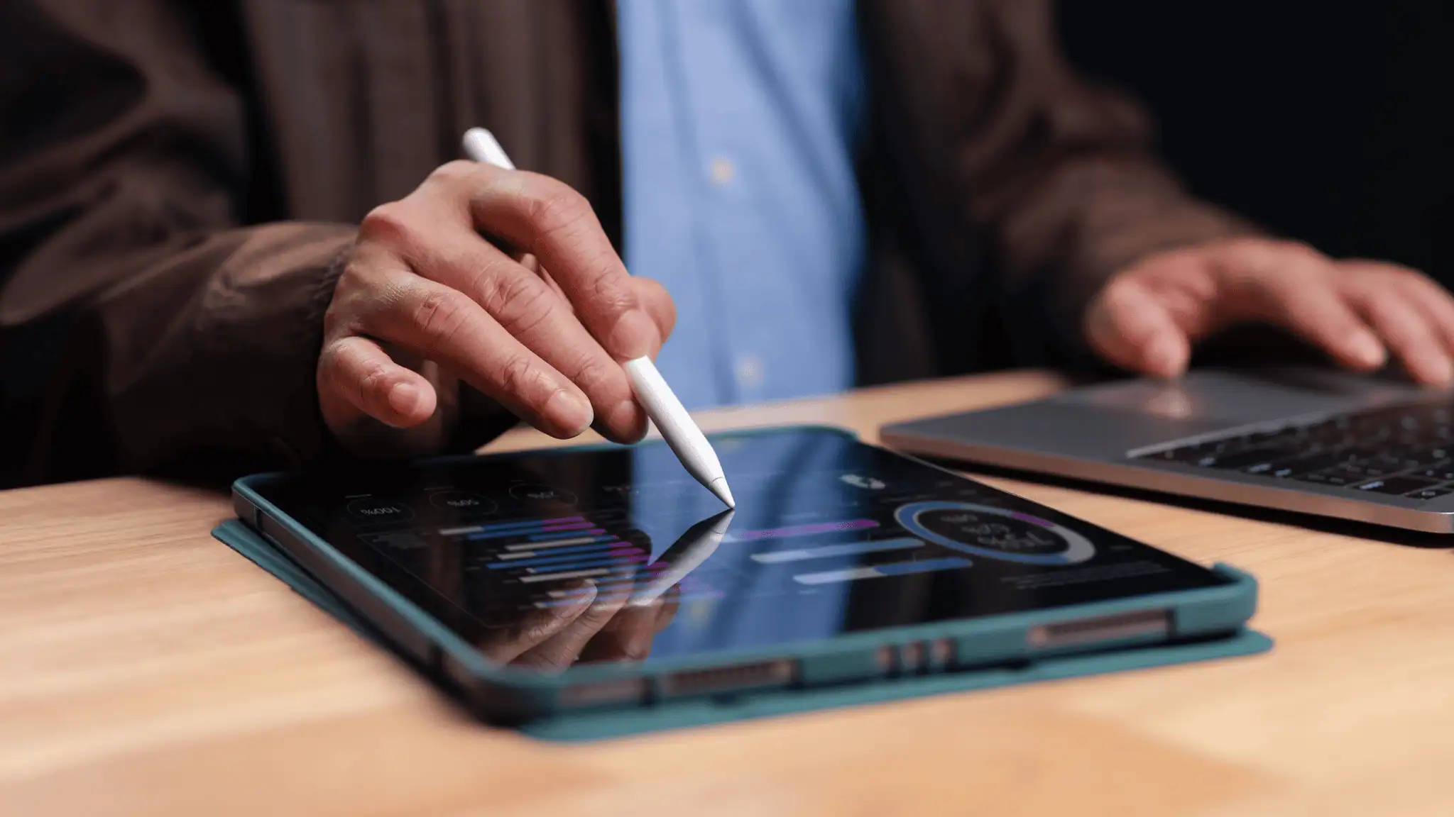 man reviewing reports 7 Signs It's Time to Replace Your Marketing Agency