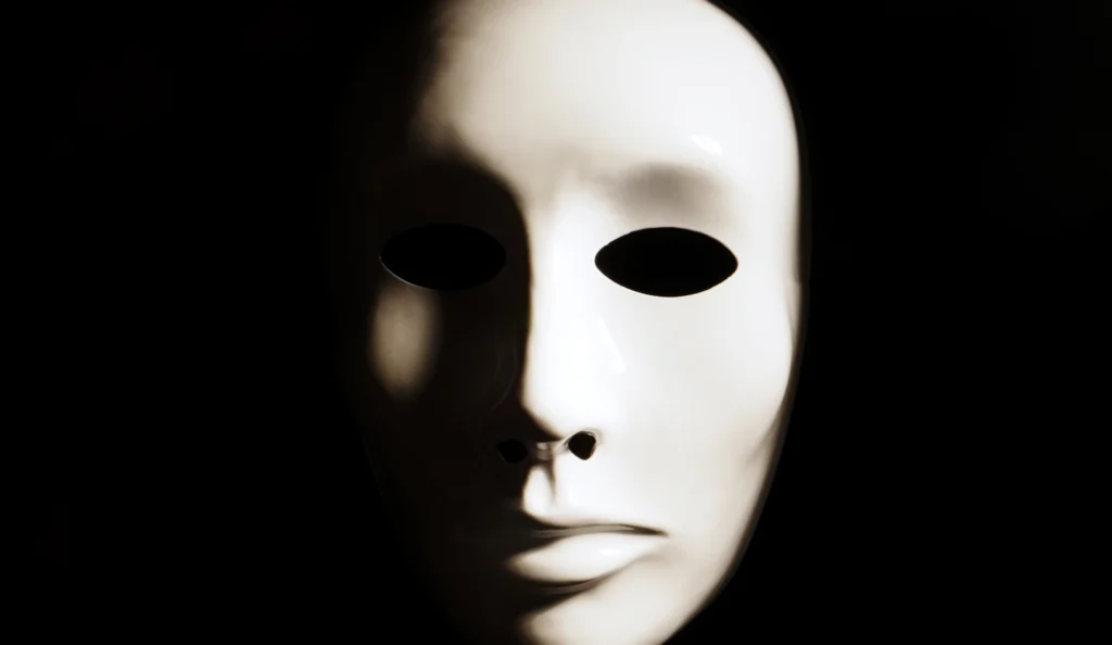 business wearing to many masks